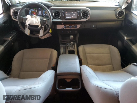 2018 Toyota Tacoma SR5 with VIN 3TMAZ5CN9JM075289, listed as a Copart auction lot 52409365 with 65,793 mi miles and Salvage Title. Bid and sale history available at DreamBid. Image 8.