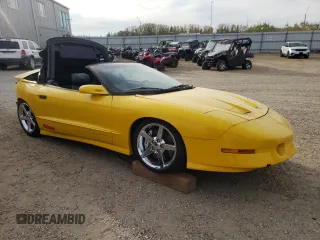 1995 Pontiac Firebird Trans Am z VIN 2G2FV32P6S2225763, wystawiony jako Copart lot #69555203 z przebiegiem 126 643 mil mil oraz Szkody całkowita. Historia ofert i sprzedaży dostępna na DreamBid. Obrazek 4.