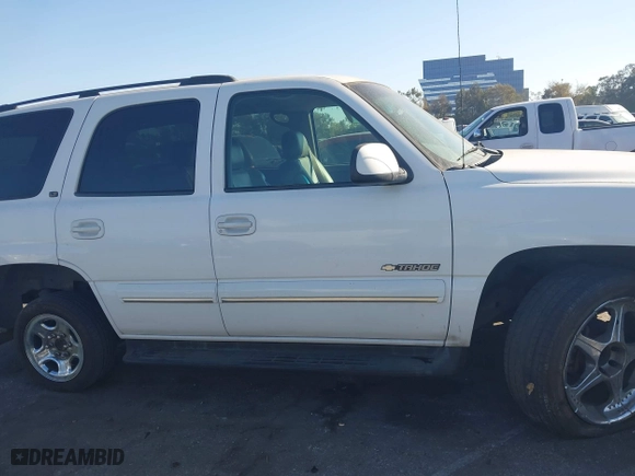 2003 Chevrolet Tahoe LT with VIN 1GNEC13Z73R168819, listed as a IAAI auction lot 41679179 with 141,164 mi miles. Bid and sale history available at carsss.com. Image 12.