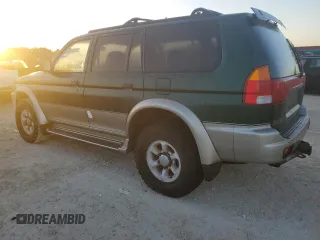1999 Mitsubishi Montero Limited z VIN JA4LS41RXXP010154, wystawiony jako Copart lot #77666734 z przebiegiem Nie podano mil oraz Szkoda całkowita • Salvage title. Historia ofert i sprzedaży dostępna na DreamBid. Obrazek 2.