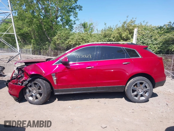 2012 Cadillac SRX Premium Collection with VIN 3GYFNFE35CS579477, listed as a IAAI auction lot 42230628 with 138,789 mi miles and . Bid and sale history available at DreamBid. Image 14.