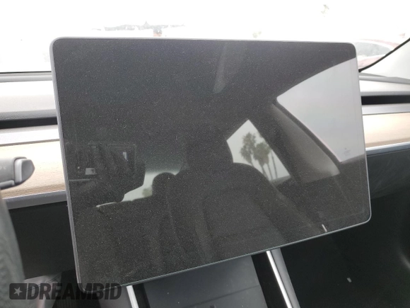 2020 Tesla Model 3 Standard Range Plus with VIN 5YJ3E1EA5LF747010, listed as a Copart auction lot 50937975 with Not Provided miles and Salvage Title. Bid and sale history available at DreamBid. Image 9.