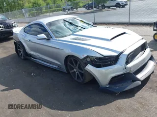 2016 Ford Mustang V6 z VIN 1FA6P8AM0G5244935, wystawiony jako IAAI lot #42155704 z przebiegiem 104 748 mil mil oraz . Historia ofert i sprzedaży dostępna na DreamBid. Obrazek 1.