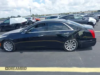 2014 Cadillac CTS RWD with VIN 1G6AP5SX0E0185913, listed as a IAAI auction lot 42685622 with 107,406 mi miles and . Bid and sale history available at DreamBid. Image 14.