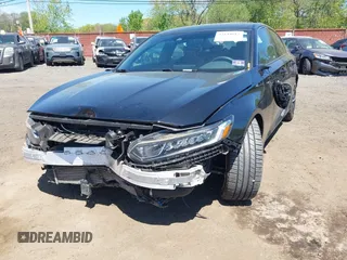 2020 Honda Accord Sport with VIN 1HGCV2F32LA001310, listed as a IAAI auction lot 42144612 with 54,728 mi miles and . Bid and sale history available at DreamBid. Image 6.