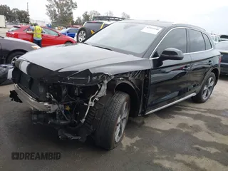 2023 Audi Q5 Premium Plus z VIN WA1BBAFY7P2187588, wystawiony jako IAAI lot #42052046 z przebiegiem 18 987 mil mil oraz . Historia ofert i sprzedaży dostępna na DreamBid. Obrazek 18.