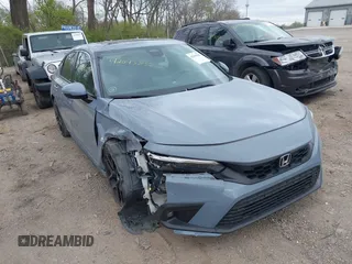 2022 Honda Civic Sport Touring z VIN 19XFL1H81NE023917, wystawiony jako IAAI lot #42043832 z przebiegiem 32 707 mil mil oraz . Historia ofert i sprzedaży dostępna na DreamBid. Obrazek 1.