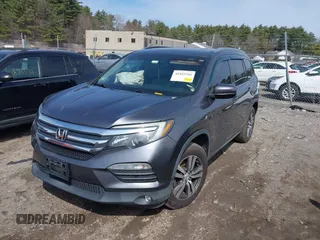 2017 Honda Pilot EX-L with VIN 5FNYF6H5XHB009029, listed as a IAAI auction lot 41883366 with 95,711 mi miles and . Bid and sale history available at DreamBid. Image 17.