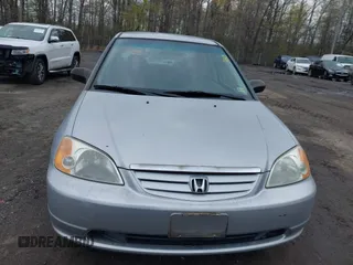 2001 Honda Civic LX with VIN 1HGES16581L043706, listed as a IAAI auction lot 42045657 with 149,285 mi miles. Bid and sale history available at carsss.com. Image 6.