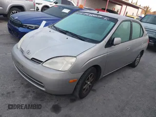 2002 Toyota Prius z VIN JT2BK18U620059498, wystawiony jako IAAI lot #41841301 z przebiegiem 248 718 mil mil oraz . Historia ofert i sprzedaży dostępna na DreamBid. Obrazek 2.