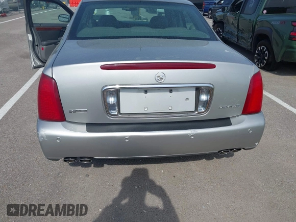 2005 Cadillac DeVille z VIN 1G6KD54Y65U192442, wystawiony jako IAAI lot #42257163 z przebiegiem 100 381 mil mil oraz . Historia ofert i sprzedaży dostępna na DreamBid. Obrazek 6.
