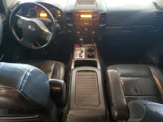 2012 Nissan Titan SL with VIN 1N6BA0ECXCN300562, listed as a Copart auction lot 58244125 with 131,595 mi miles and Salvage title. Bid and sale history available at DreamBid. Image 8.