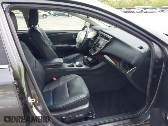 2013 Toyota Avalon XLE with VIN 4T1BK1EB8DU019702, listed as a IAAI auction lot 41909041 with 79,819 mi miles and . Bid and sale history available at DreamBid. Image 5.