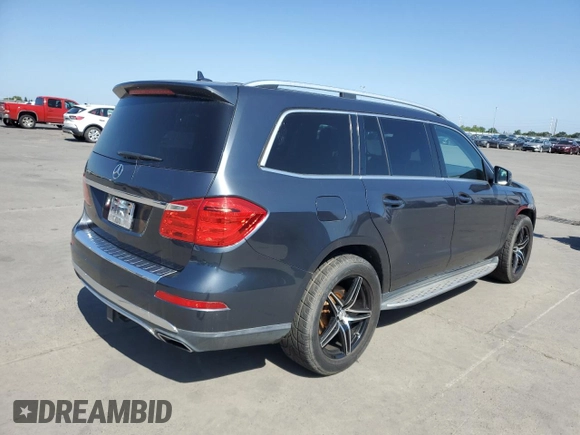 2014 Mercedes-Benz GL 450 with VIN 4JGDF7CE1EA278029, listed as a Copart auction lot 55501885 with 143,250 mi miles and Salvage title. Bid and sale history available at DreamBid. Image 3.
