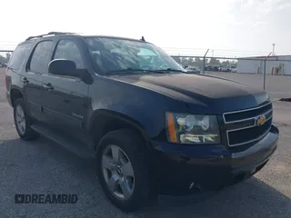 2014 Chevrolet Tahoe LT with VIN 1GNSCBE07ER120098, listed as a IAAI auction lot 42623461 with 166,170 mi miles and . Bid and sale history available at DreamBid. Image 1.