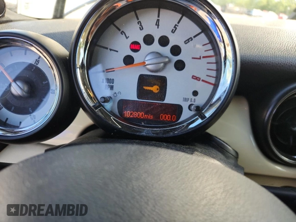 2011 MINI Convertible with VIN WMWZN3C59BTZ78433, listed as a Copart auction lot 65509575 with 102,800 mi miles and Clean title. Bid and sale history available at DreamBid. Image 9.