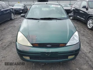 2000 Ford Focus SE with VIN 1FAFP3433YW354797, listed as a Copart auction lot 61430265 with 165,202 mi miles and Salvage title. Bid and sale history available at DreamBid. Image 5.