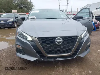 2019 Nissan Altima SR with VIN 1N4BL4CV8KN301609, listed as a IAAI auction lot 41608699 with 159,931 mi miles and . Bid and sale history available at carsss.com. Image 6.