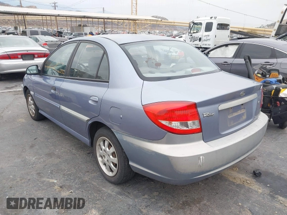 2003 Kia Rio with VIN KNADC125736236506, listed as a IAAI auction lot 41467649 with 109,975 mi miles. Bid and sale history available at carsss.com. Image 3.