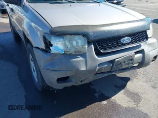 2001 Ford Escape XLS с VIN 1FMYU01B11KA16460, выставлен на аукционе IAAI как лот 42346546 с пробегом 264 160 миль миль и . История ставок и продаж доступна на DreamBid. Изображение 6.