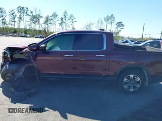 2019 Honda Ridgeline RTL-E with VIN 5FPYK3F72KB024461, listed as a IAAI auction lot 41813568 with 122,364 mi miles and . Bid and sale history available at DreamBid. Image 13.