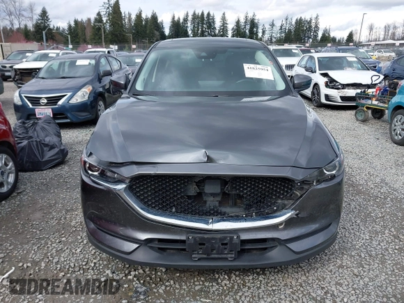 2021 Mazda CX-5 Touring with VIN JM3KFBCM2M0484011, listed as a IAAI auction lot 41825954 with 48,958 mi miles. Bid and sale history available at carsss.com. Image 12.