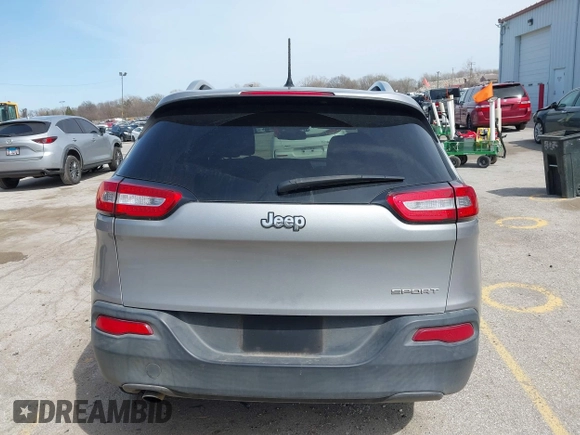 2015 Jeep Cherokee Sport with VIN 1C4PJLAB2FW696010, listed as a IAAI auction lot 42032956 with 88,323 mi miles. Bid and sale history available at carsss.com. Image 16.