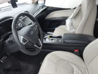 2018 Ford Fusion Hybrid Titanium with VIN 3FA6P0RUXJR159658, listed as a IAAI auction lot 41615954 with 101,475 mi miles. Bid and sale history available at carsss.com. Image 5.