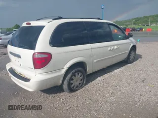 2007 Chrysler Town & Country LWB Touring with VIN 2A4GP54L67R151544, listed as a IAAI auction lot 42027456 with Not Provided miles. Bid and sale history available at carsss.com. Image 4.