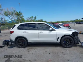 2019 BMW X5 xDrive40i with VIN 5UXCR6C51KLK83456, listed as a IAAI auction lot 42027389 with 94,332 mi miles and . Bid and sale history available at DreamBid. Image 13.