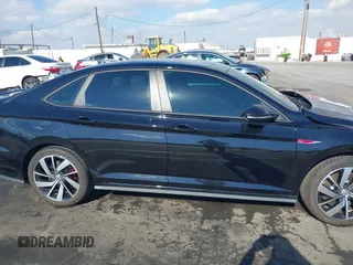 2021 Volkswagen Jetta GLI S with VIN 3VW6T7BU7MM002015, listed as a IAAI auction lot 41349898 with 44,416 mi miles and . Bid and sale history available at DreamBid. Image 14.