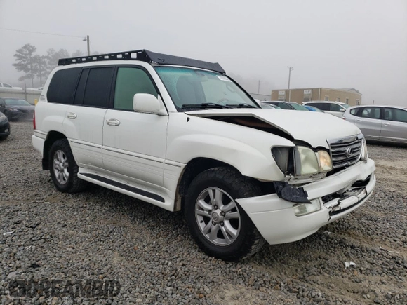 2004 Lexus LX 470 with VIN JTJHT00W343547828, listed as a Copart auction lot 48982045 with 196,877 mi miles and Salvage Title. Bid and sale history available at DreamBid. Image 4.