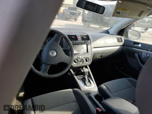 2007 Volkswagen Rabbit z VIN WVWDR71K37W177181, wystawiony jako Copart lot #42920935 z przebiegiem 142 123 mil mil oraz Czysty tytuł • Clean title. Historia ofert i sprzedaży dostępna na DreamBid. Obrazek 8.