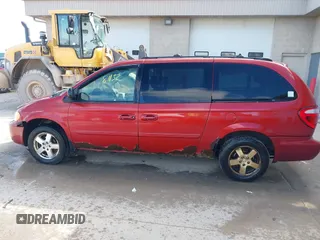 2005 Dodge Grand Caravan with VIN 2D4G944L75R310409, listed as a IAAI auction lot 41781132 with 128,120 mi miles and . Bid and sale history available at DreamBid. Image 14.