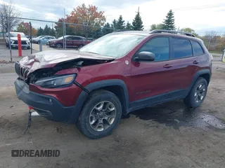 2019 Jeep Cherokee Trailhawk Elite with VIN 1C4PJMBX6KD378848, listed as a IAAI auction lot 40754408 with 52,901 mi miles. Bid and sale history available at carsss.com. Image 2.