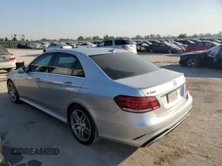 2015 Mercedes-Benz E 350 Luxury with VIN WDDHF8JB7FB134619, listed as a Copart auction lot 73518344 with 185,128 mi miles and Salvage title. Bid and sale history available at DreamBid. Image 2.