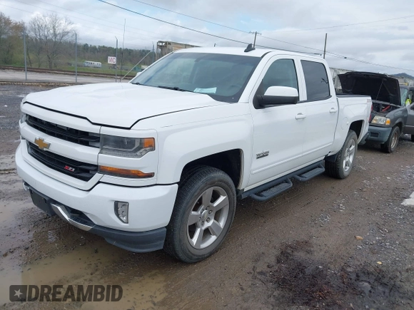 2016 Chevrolet Silverado 1500 LT with VIN 3GCUKREC0GG136136, listed as a IAAI auction lot 41971199 with 179,045 mi miles and . Bid and sale history available at DreamBid. Image 17.