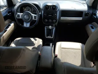 2016 Jeep Compass High Altitude Edition with VIN 1C4NJCEA7GD789837, listed as a Copart auction lot 52000505 with 96,396 mi miles and Salvage Title. Bid and sale history available at carsss.com. Image 8.