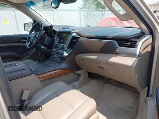 2015 Chevrolet Tahoe LTZ z VIN 1GNSKCKC0FR113647, wystawiony jako IAAI lot #42288089 z przebiegiem 113 322 mil mil oraz . Historia ofert i sprzedaży dostępna na DreamBid. Obrazek 5.