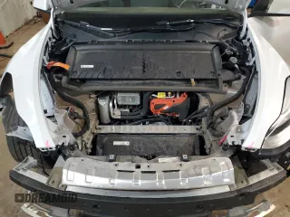 2023 Tesla Model Y Long Range z VIN 7SAYGDEE5PF619265, wystawiony jako Copart lot #48418655 z przebiegiem 42 233 mil mil oraz Szkoda całkowita • Salvage title. Historia ofert i sprzedaży dostępna na DreamBid. Obrazek 13.