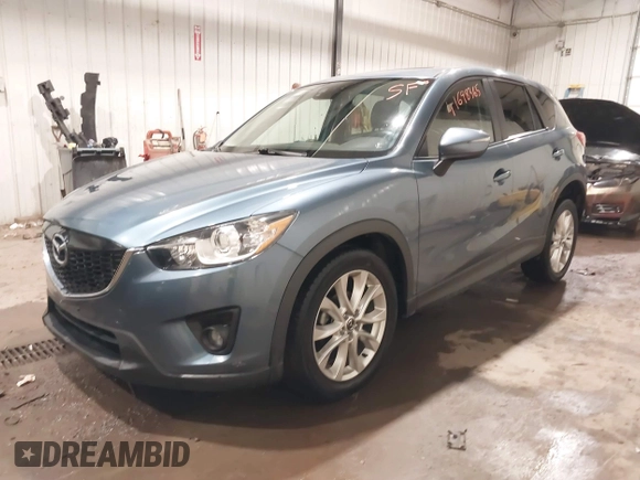 2015 Mazda CX-5 Grand Touring with VIN JM3KE4DY7F0504398, listed as a IAAI auction lot 41698365 with 122,121 mi miles. Bid and sale history available at carsss.com. Image 17.