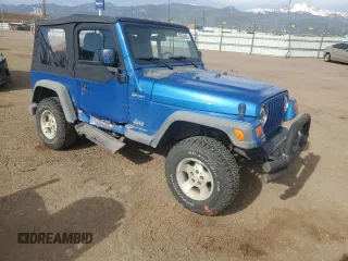2003 Jeep Wrangler Sport z VIN 1J4FA49S53P350281, wystawiony jako Copart lot #56634005 z przebiegiem 158 974 mil mil oraz Szkoda całkowita • Salvage title. Historia ofert i sprzedaży dostępna na DreamBid. Obrazek 4.