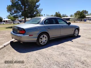 2003 Jaguar S-Type with VIN SAJEA01U93HM78946, listed as a Copart auction lot 54582105 with 132,560 mi miles and Clean Title. Bid and sale history available at DreamBid. Image 4.