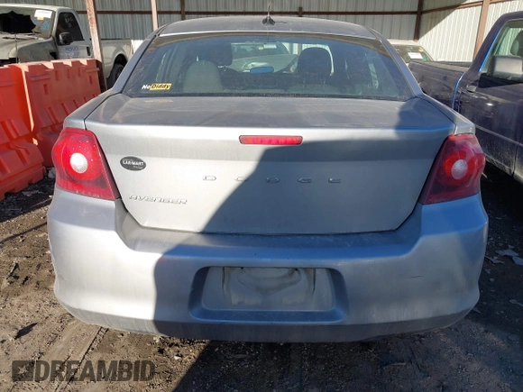 2013 Dodge Avenger SE with VIN 1C3CDZAB4DN590562, listed as a IAAI auction lot 41689241 with 258,167 mi miles and . Bid and sale history available at carsss.com. Image 16.