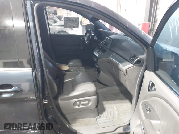 2010 Honda Odyssey Touring with VIN 5FNRL3H98AB095042, listed as a IAAI auction lot 41394894 with 254,525 mi miles. Bid and sale history available at carsss.com. Image 5.