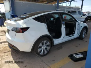 2022 Tesla Model Y Long Range z VIN 7SAYGDEE5NA015841, wystawiony jako Copart lot #57842275 z przebiegiem 51 952 mil mil oraz Szkody całkowita. Historia ofert i sprzedaży dostępna na DreamBid. Obrazek 3.
