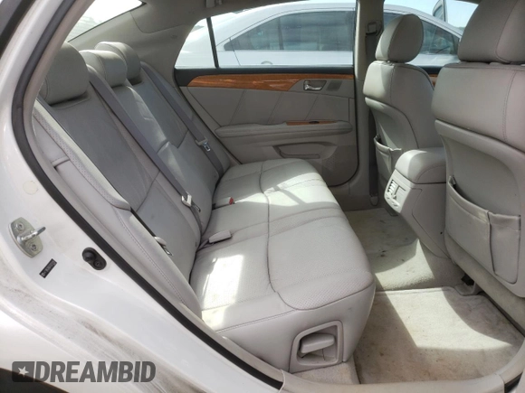 2007 Toyota Avalon XL z VIN 4T1BK36B67U251181, wystawiony jako Copart lot #58021485 z przebiegiem 166 367 mil mil oraz Szkoda całkowita • Salvage title. Historia ofert i sprzedaży dostępna na DreamBid. Obrazek 10.