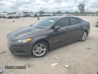 2018 Ford Fusion SE z VIN 3FA6P0LU7JR203754, wystawiony jako Copart lot #61088215 z przebiegiem 158 995 mil mil oraz Czysty tytuł • Clean title. Historia ofert i sprzedaży dostępna na DreamBid. Obrazek 1.