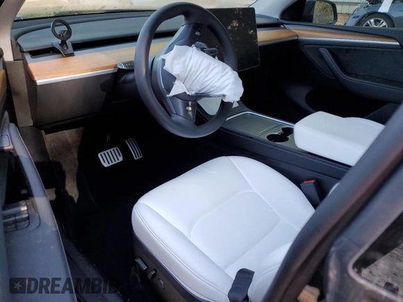 2024 Tesla Model Y Long Range с VIN 7SAYGDEE9RA230998, выставлен на аукционе Copart как лот 51682025 с пробегом Не указан миль и Списание • Salvage title. История ставок и продаж доступна на DreamBid. Изображение 8.