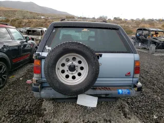 1992 Isuzu Rodeo z VIN 4S2CY58Z2N4333410, wystawiony jako Copart lot #74507154 z przebiegiem 264 327 mil mil oraz Szkody całkowita. Historia ofert i sprzedaży dostępna na DreamBid. Obrazek 6.